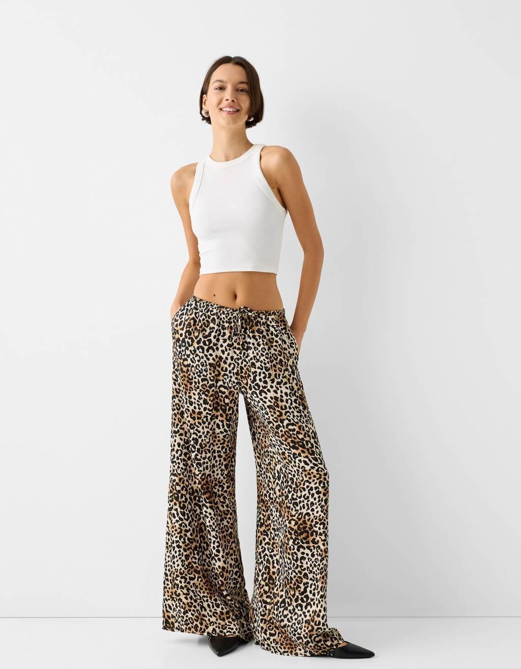 Bershka tie waist wide leg pants in leopard print Product Image