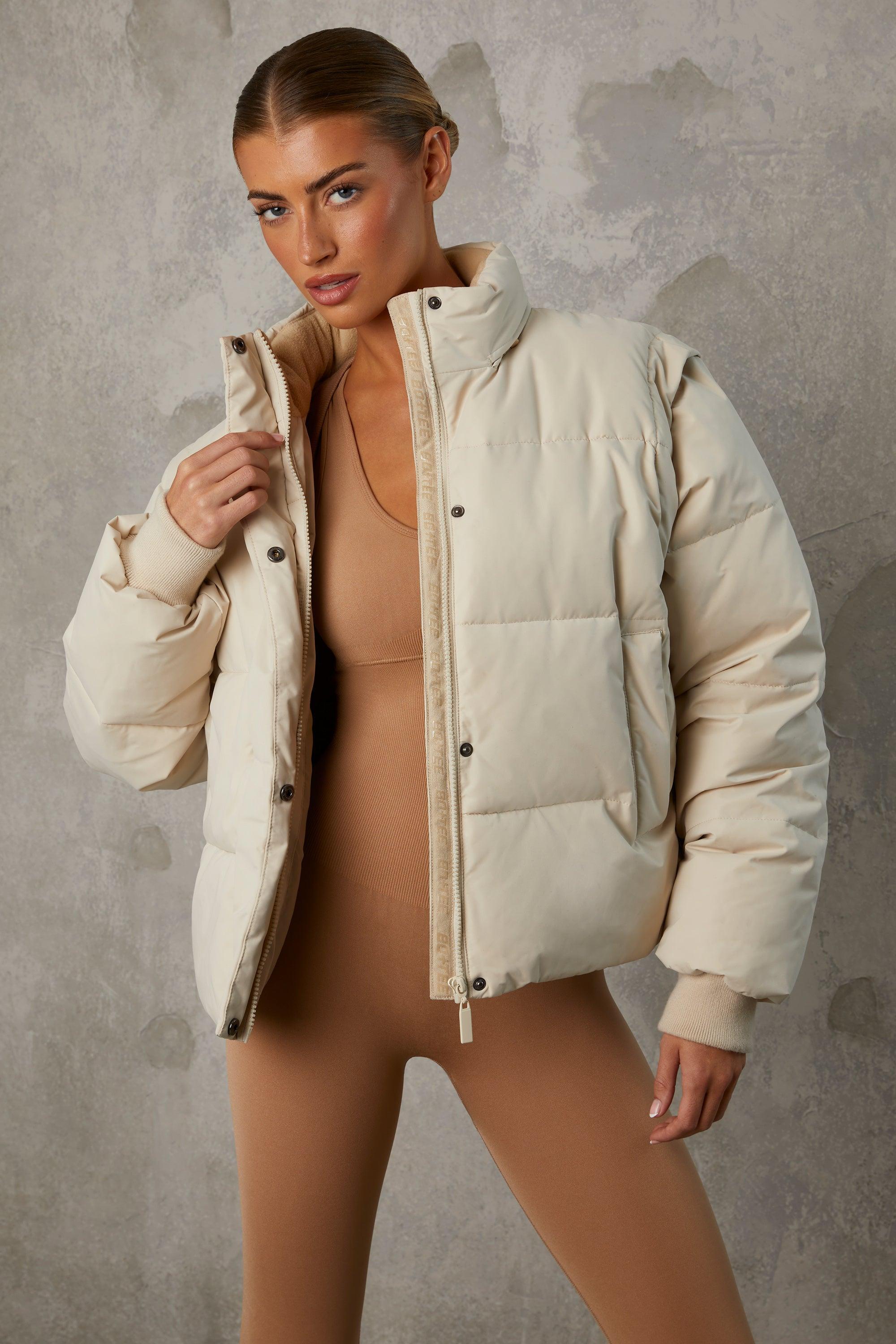 Cropped Puffer Jacket with Detachable Sleeves in Sand Product Image