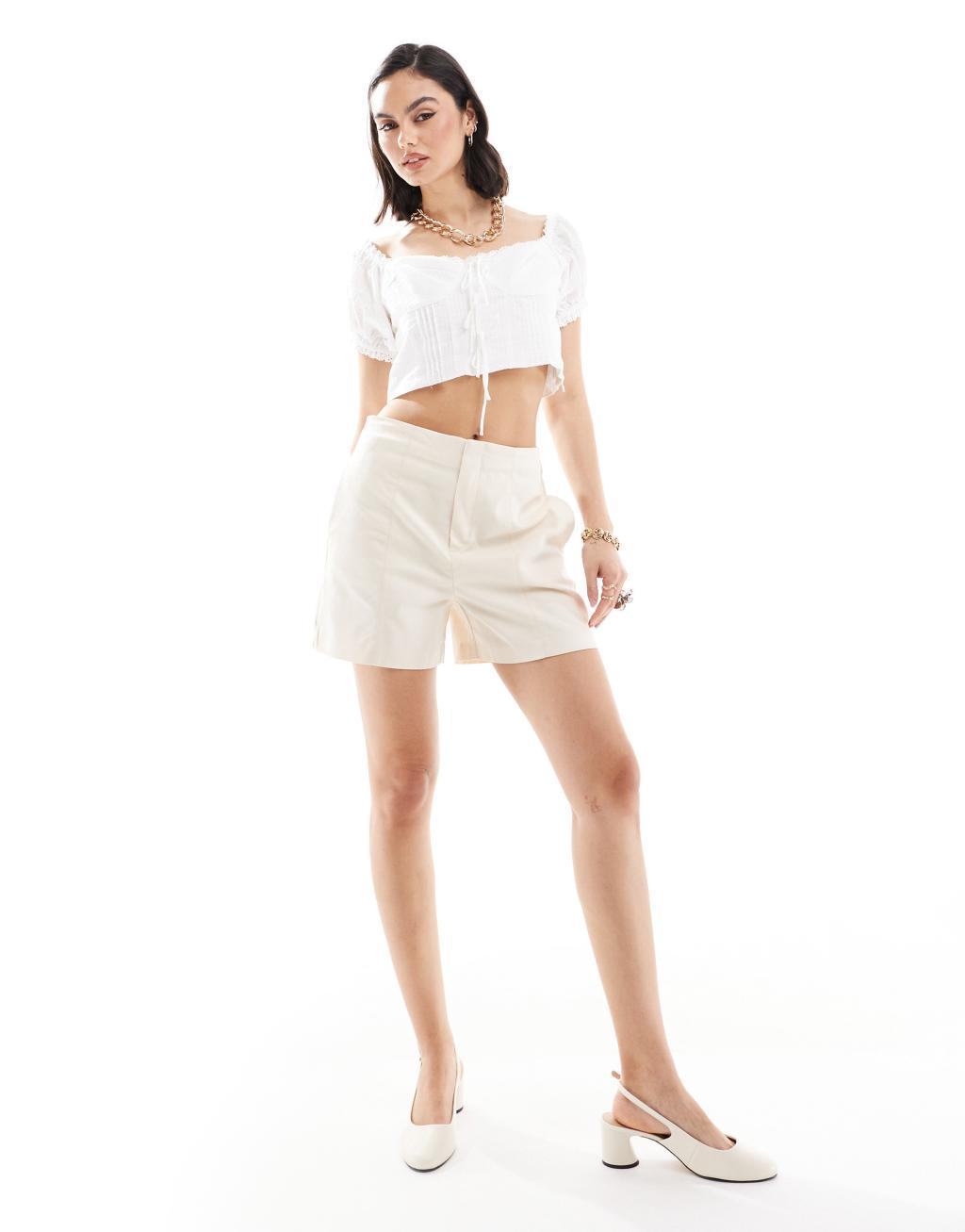 Mango puff sleeve bow front top in white Product Image