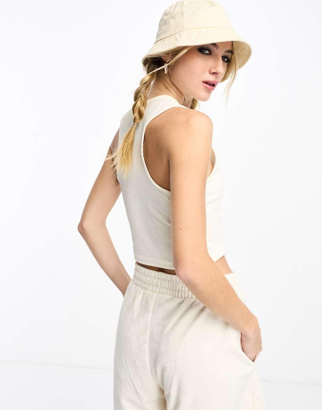 PUMA Classics terrycloth cropped tank top in beige Product Image