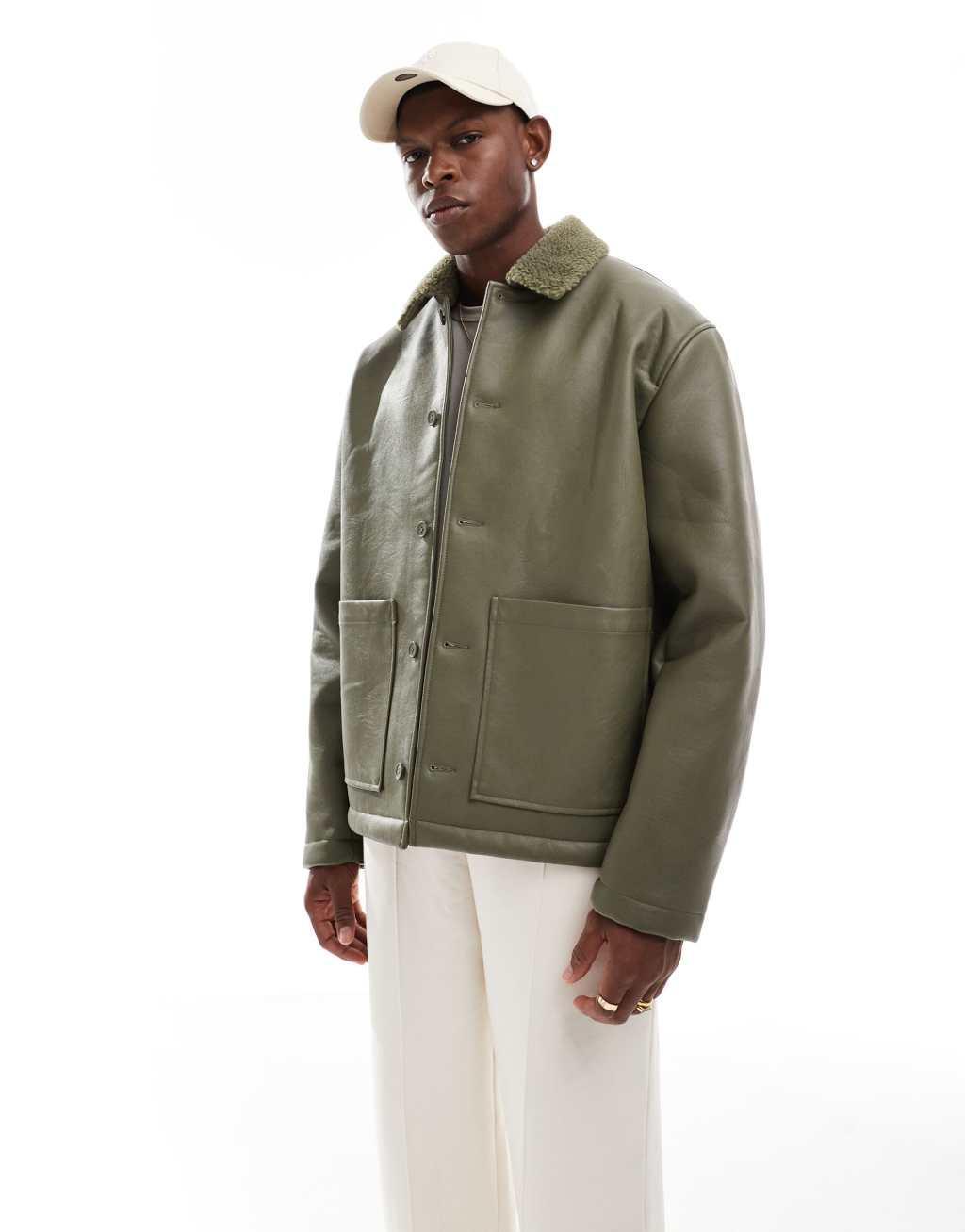 ASOS DESIGN faux leather oversized teddy lined worker jacket in green Product Image