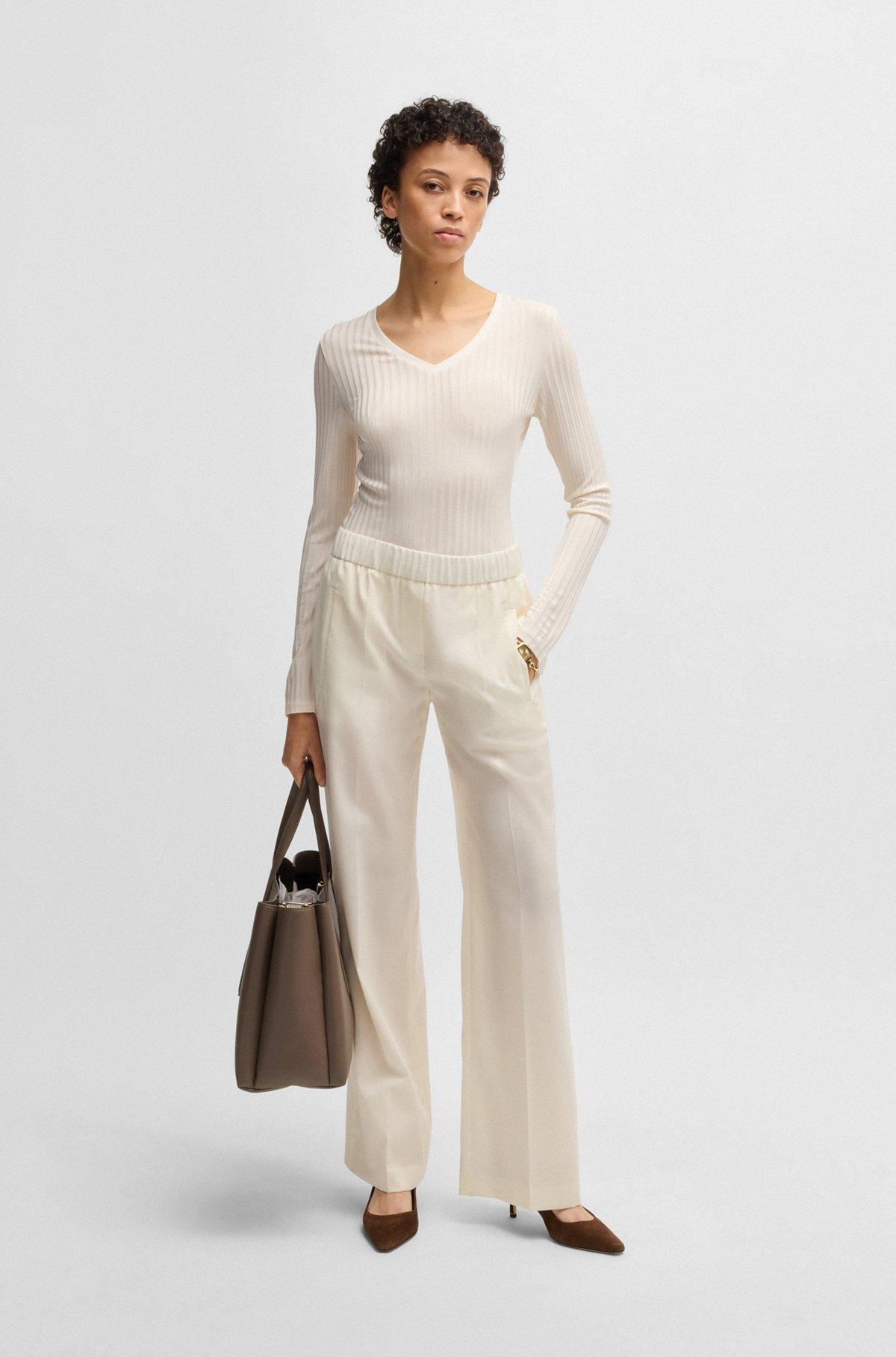 Long-sleeved V-neck top in lustrous ribbed jersey Product Image