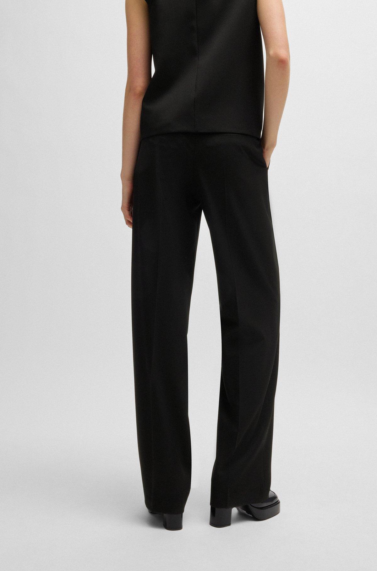 Relaxed-fit all-gender trousers with elasticated waistband Product Image