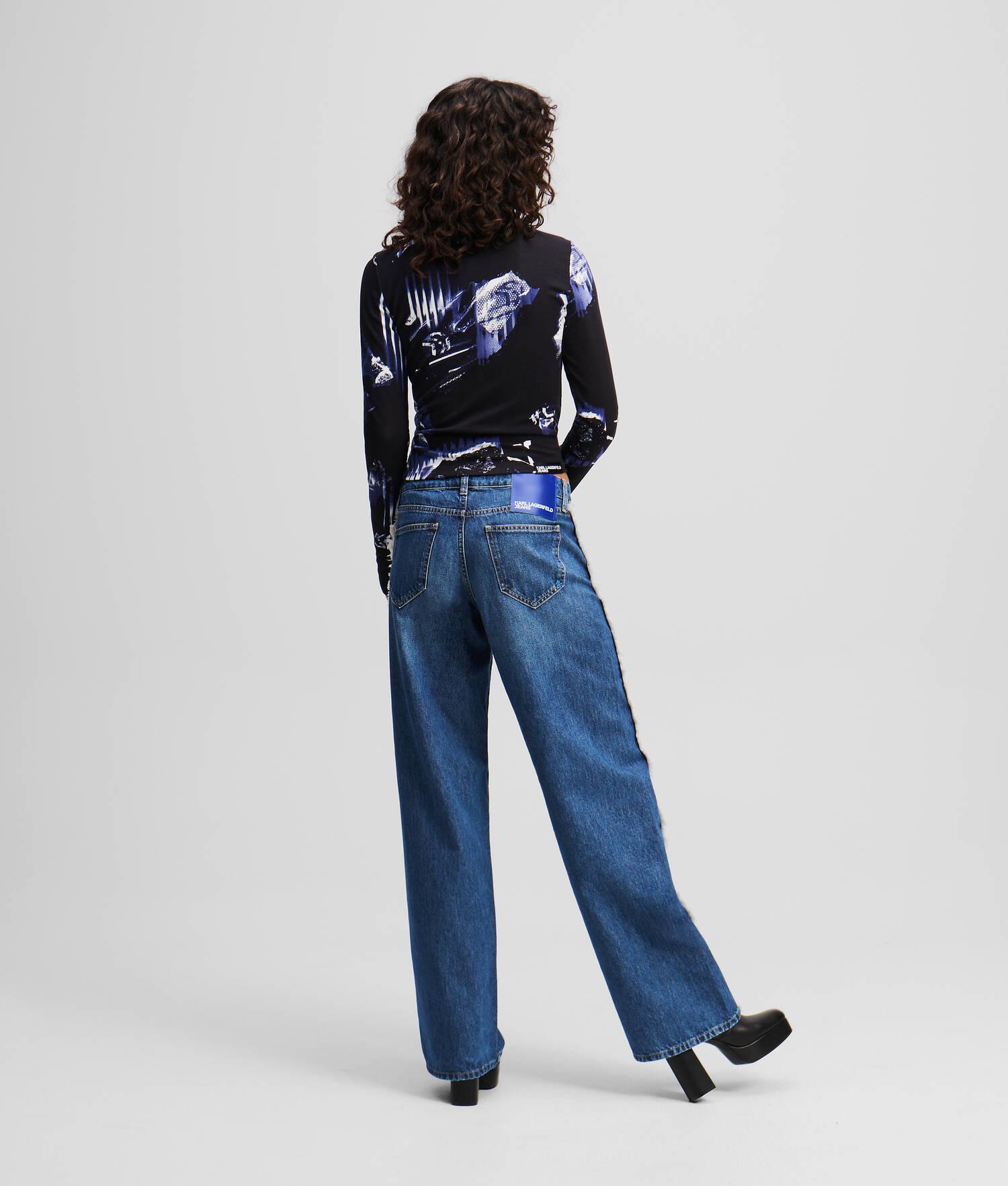 FRINGED MID-RISE RELAXED JEANS Product Image