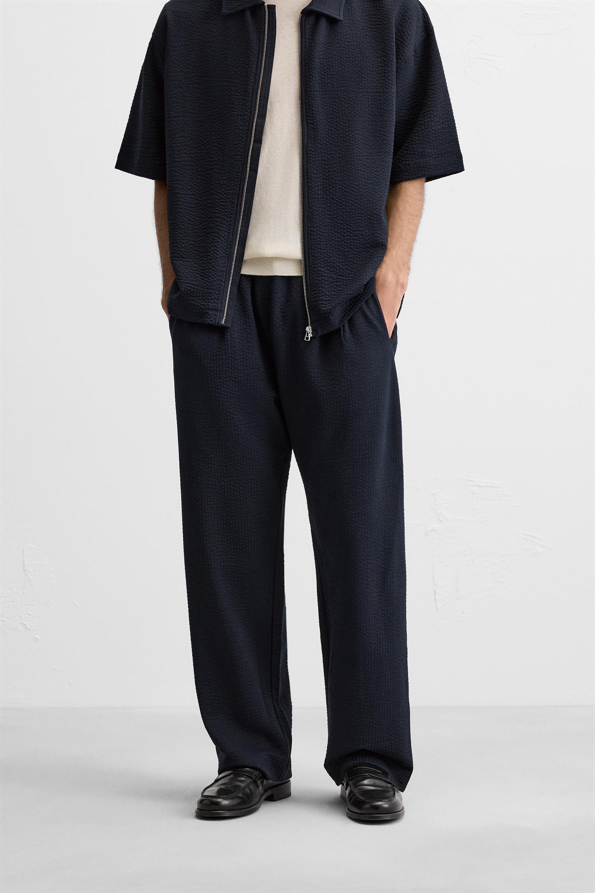 PLEATED SEERSUCKER PANTS Product Image