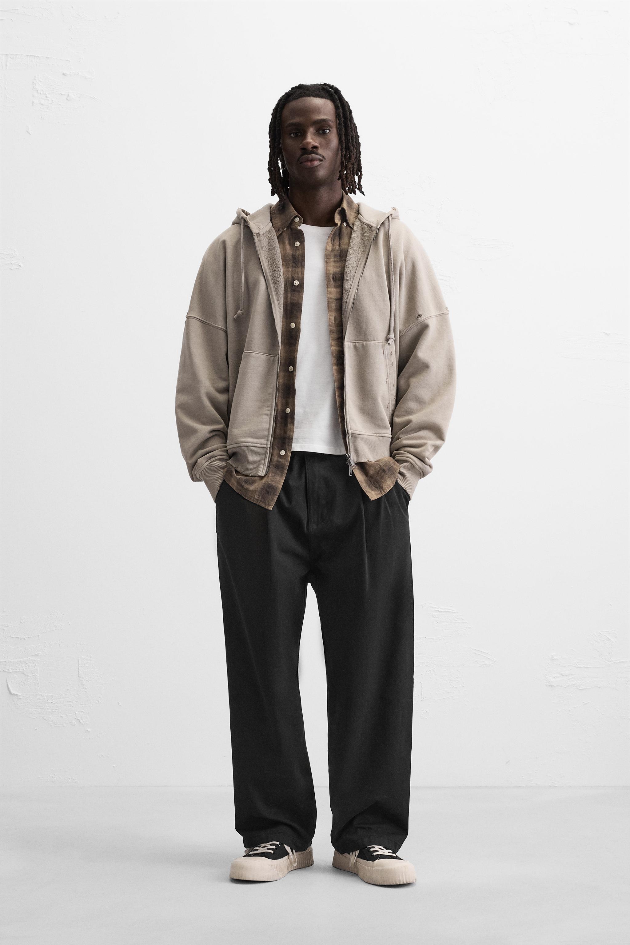 RELAXED FIT PLEATED PANTS product image