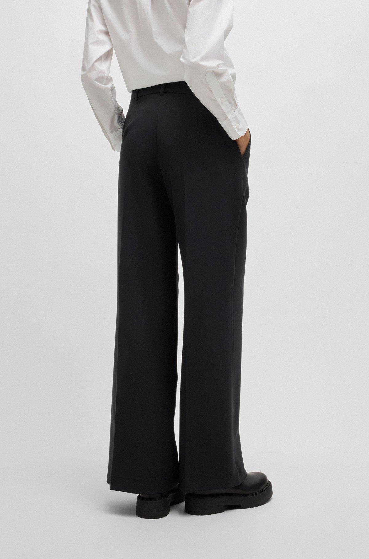 Boot-leg trousers in stretch fabric Product Image