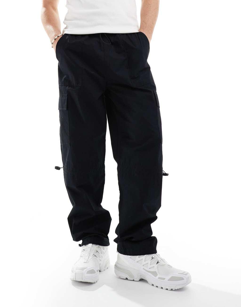 ASOS DESIGN poplin cargo pants in black with elastic waist Product Image