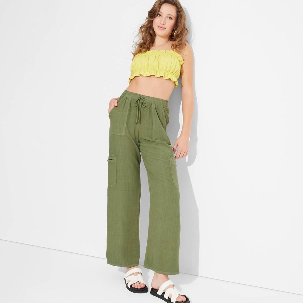 Womens Mid-Rise Wide Leg Vacation Cargo Pants - Wild Fable Olive M Product Image