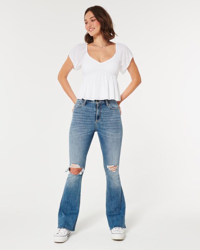 Curvy High-Rise Ripped Medium Wash Flare Jeans Product Image