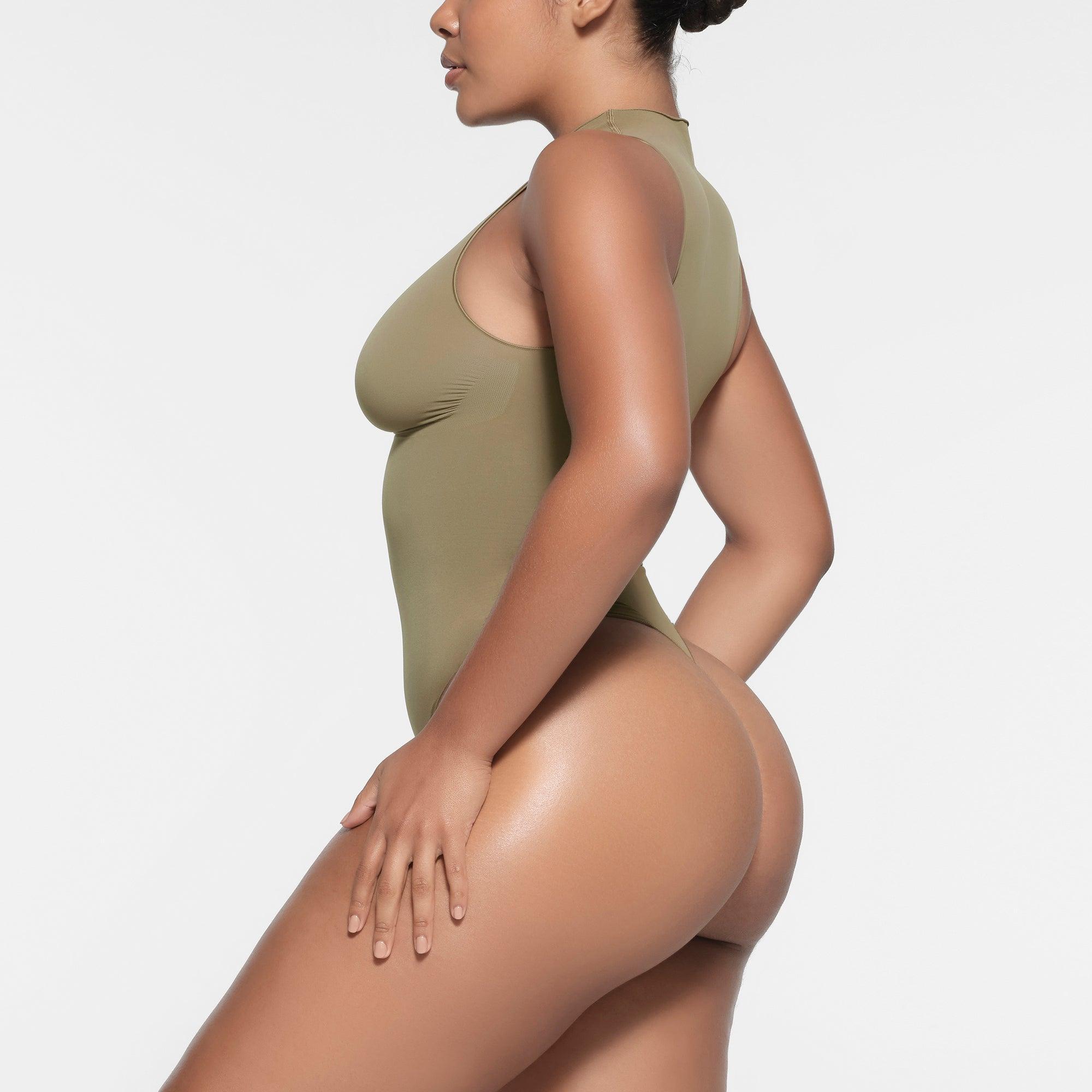 SEAMLESS SCULPT ZIP FRONT SLEEVELESS THONG BODYSUIT | ARMY Product Image