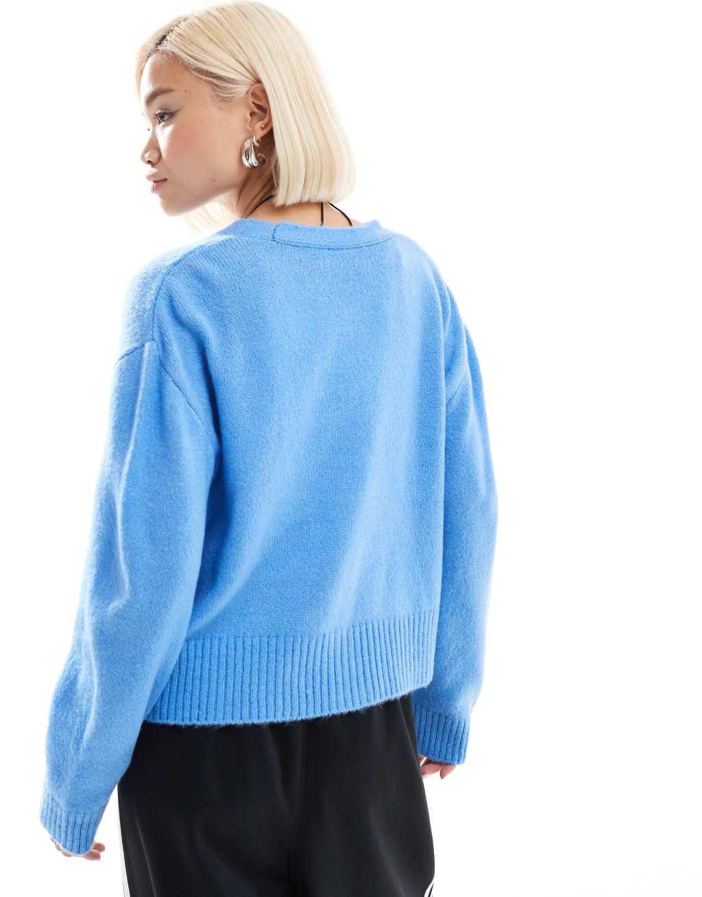 COLLUSION oversized fluffy knit cardigan in pale blue Product Image