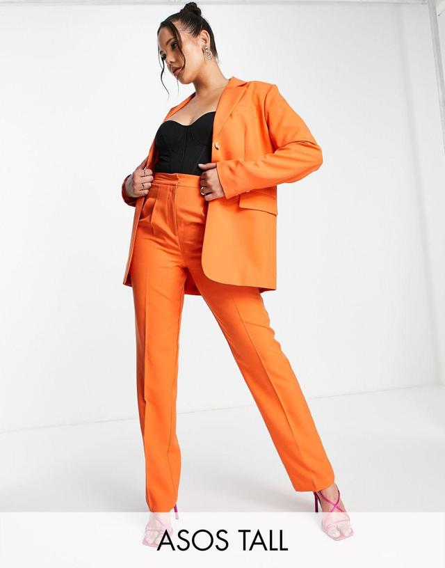 ASOS DESIGN Tall masculine suit pants with elastic waist in orange Product Image