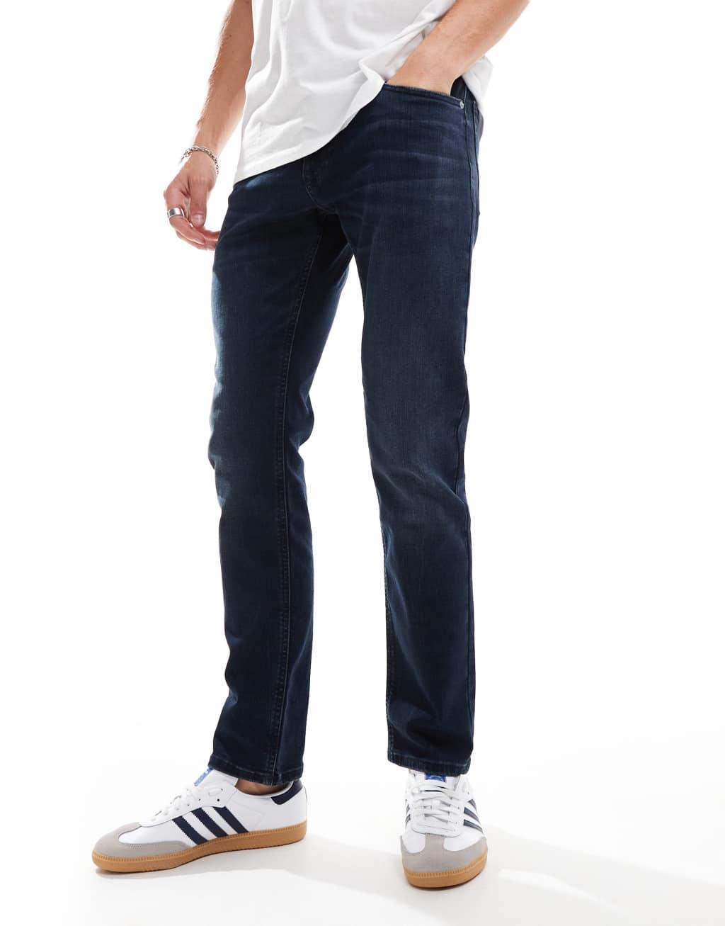 Tommy Jeans scanton slim jeans in dark denim wash Product Image