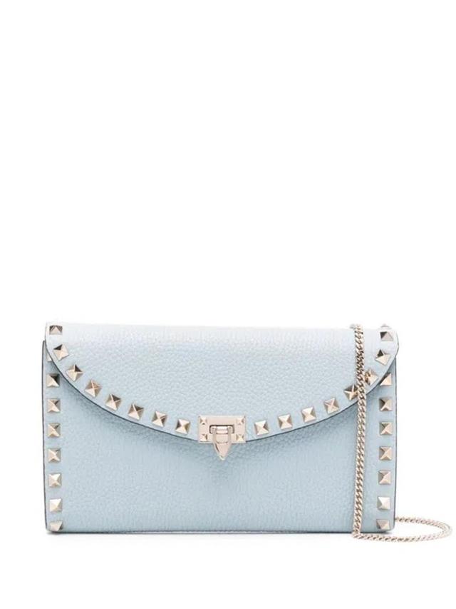 Rockstud Leather Clutch Bag In Blue Product Image