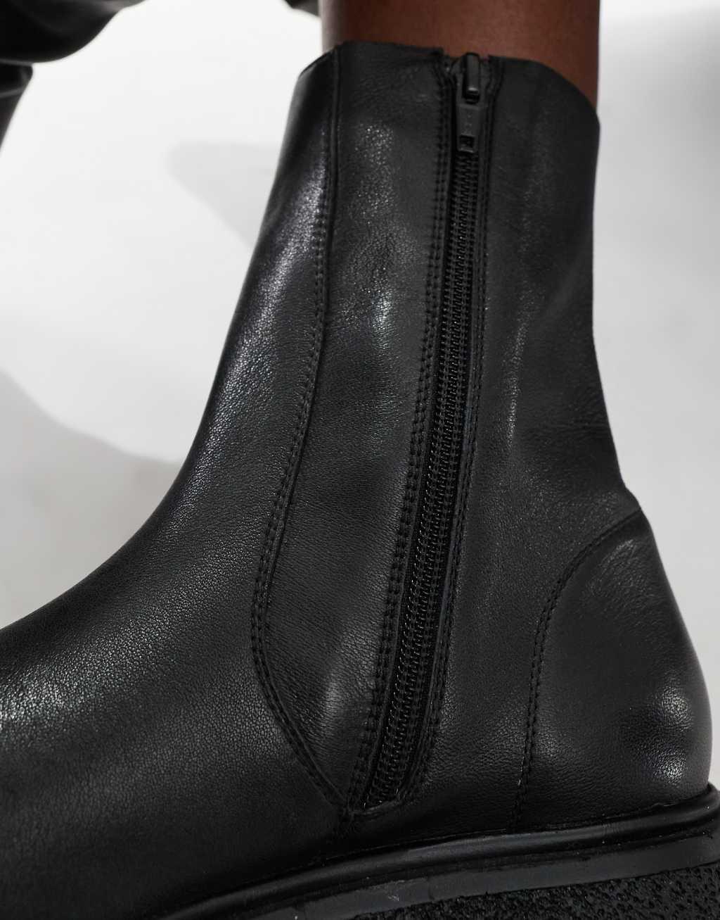 ASOS DESIGN Achieve flat leather boots in black Product Image