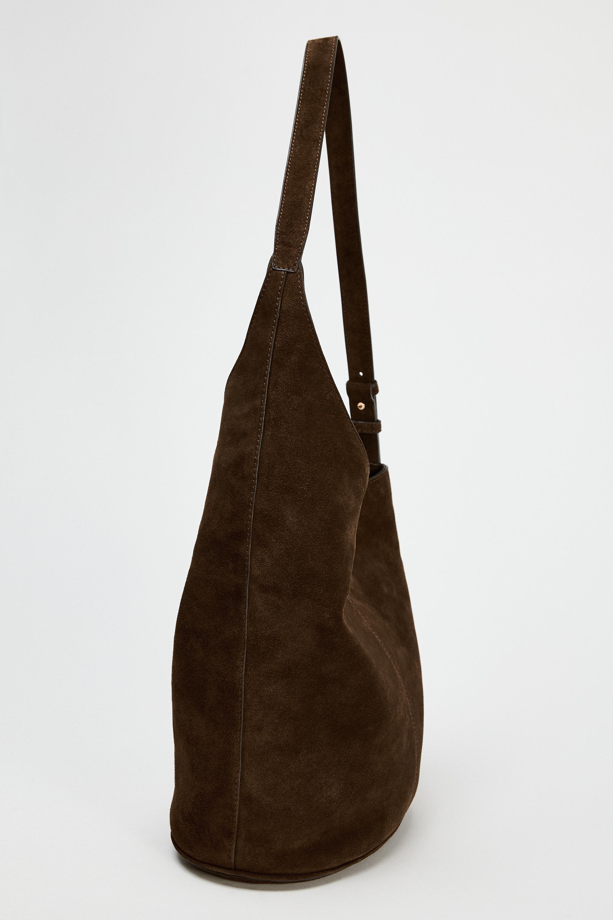 ASYMMETRIC SOFT SPLIT LEATHER BUCKET BAG Product Image