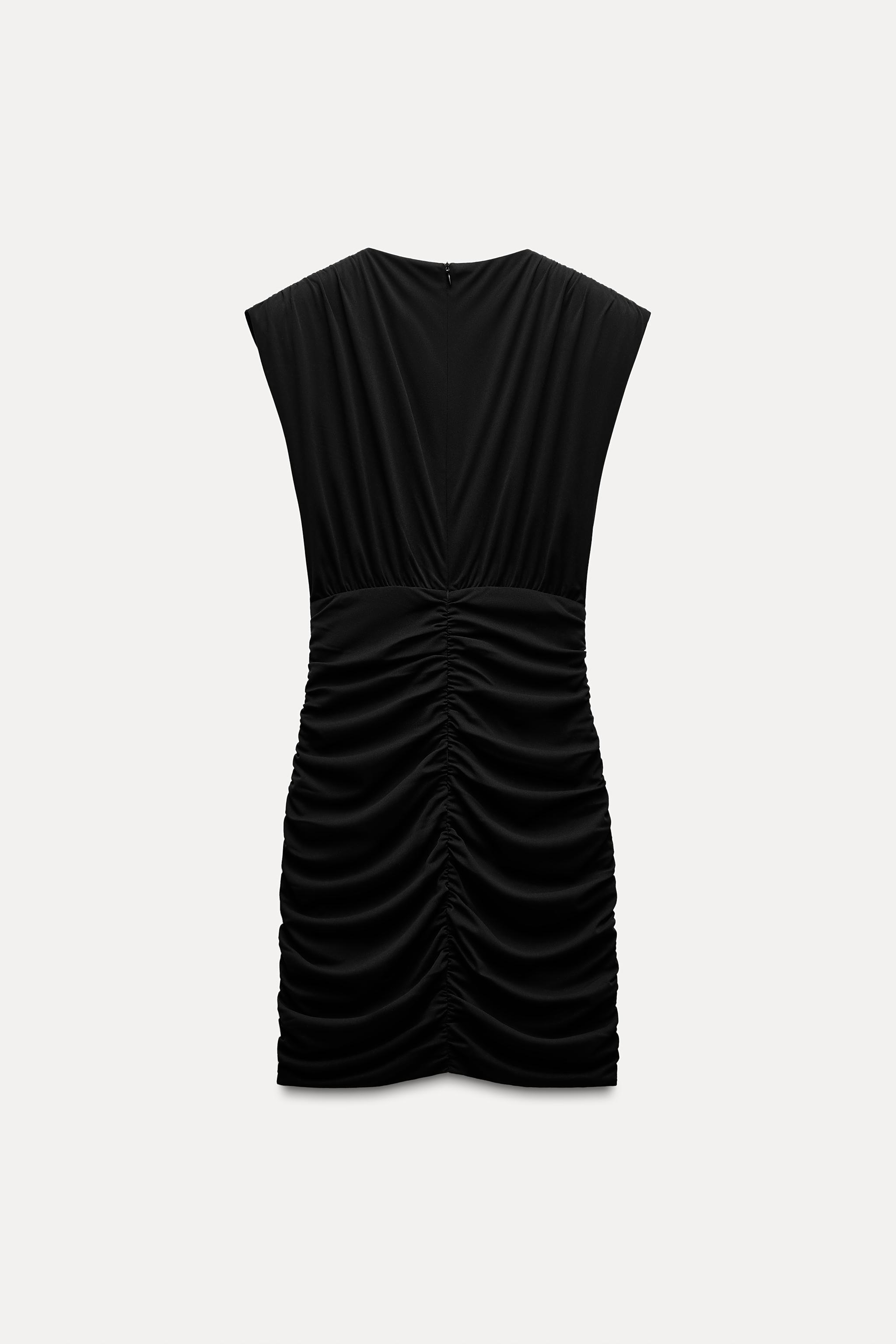 DRAPED SHOULDER PAD CUT OUT DRESS Product Image