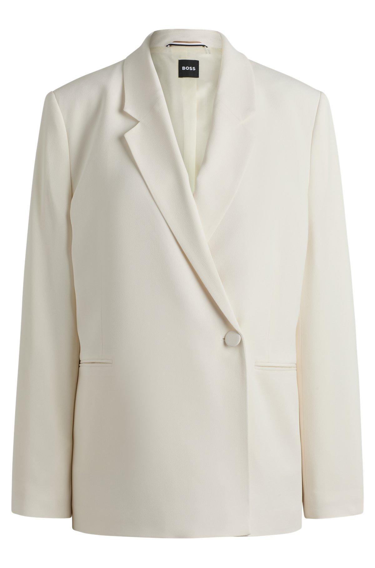 Relaxed-fit jacket with feature button Product Image