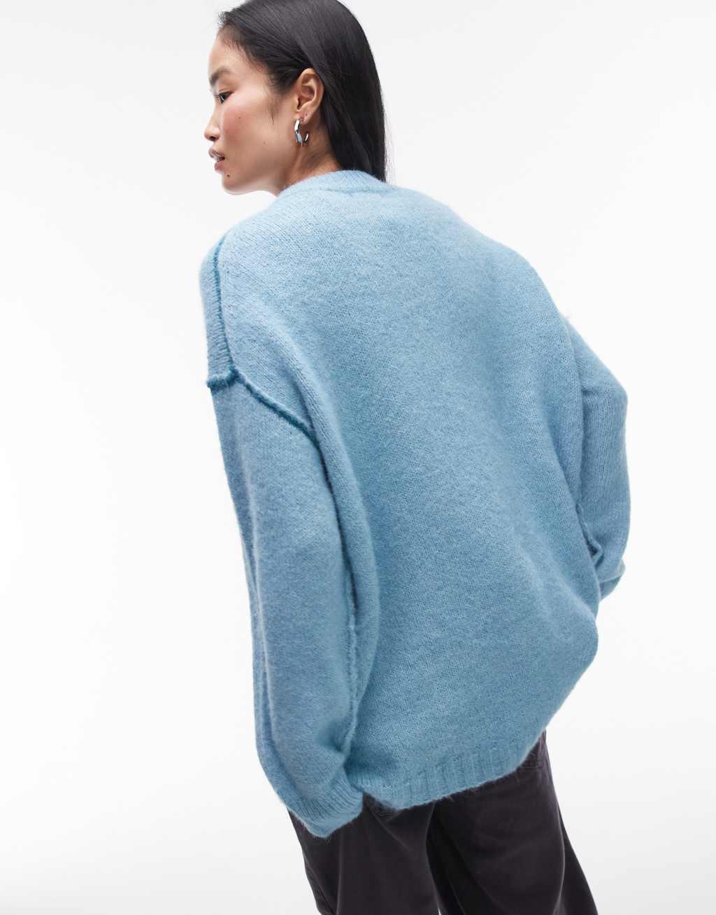 Topshop knitted exposed contrast seam oversized sweater in blue Product Image