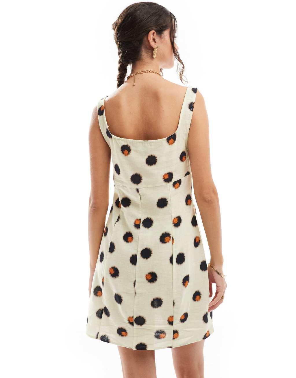 ASOS DESIGN linen scoop neck mini dress with bust seam detail in smudge spot print Product Image