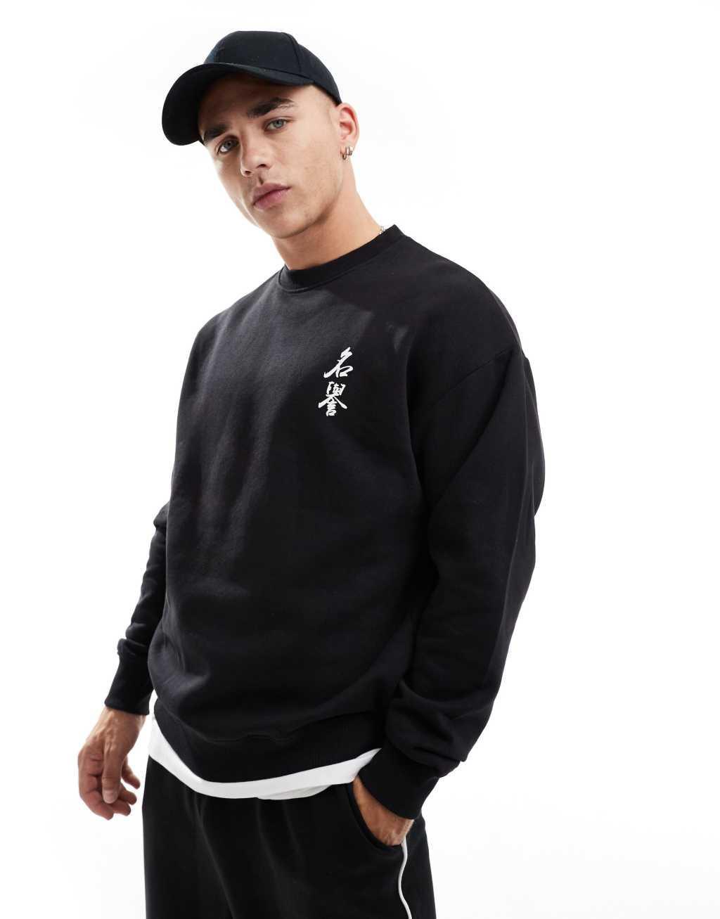 Jack & Jones oversized snake back print crew neck sweatshirt in black  Product Image