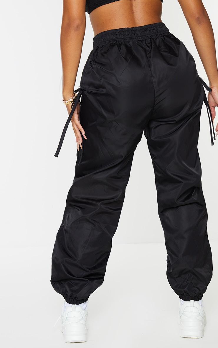 Shape Black Tie Detail Cut Out Shell Sweatpants Product Image