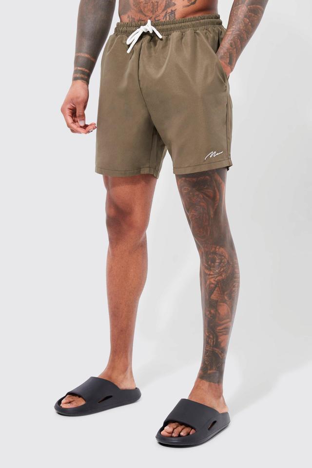 Man Signature Mid Length Swim Trunks | boohooMAN USA Product Image