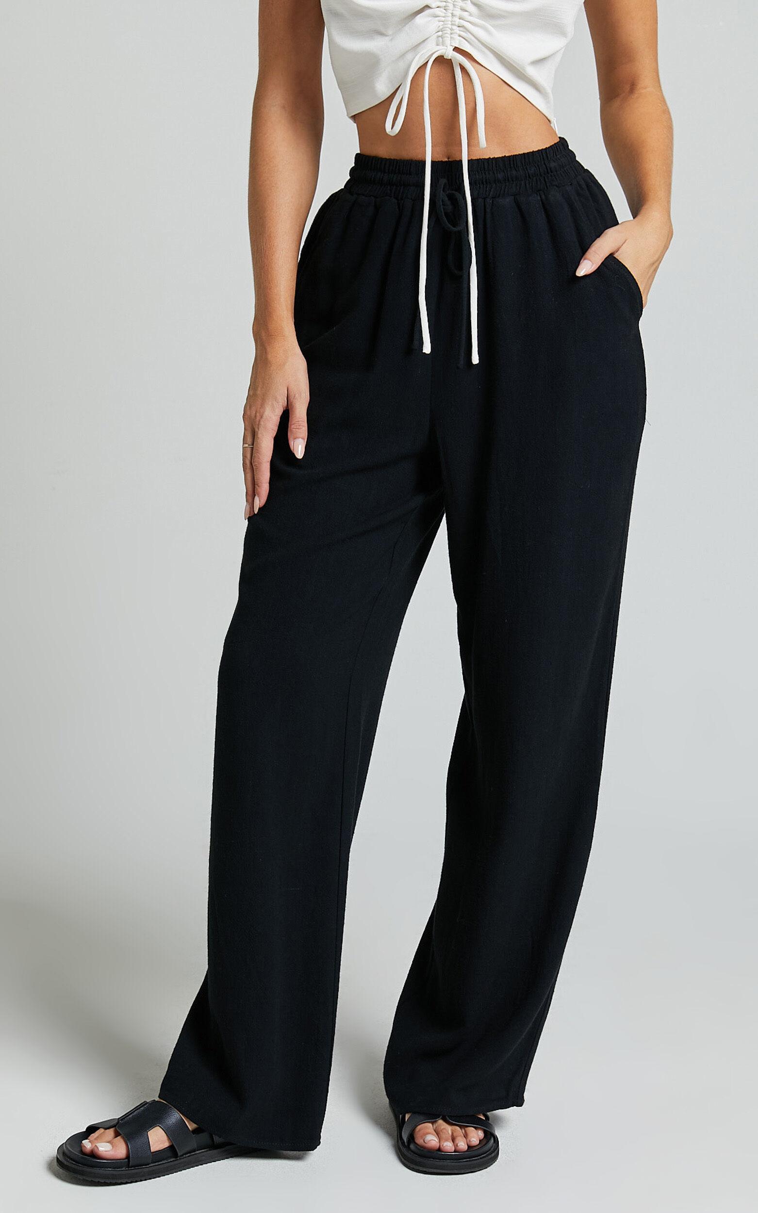 Kala Pants - Mid Waisted Relaxed Elastic Waist Pants in Black Product Image