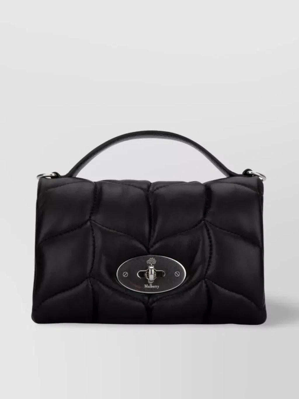 Handbags. In Black product image