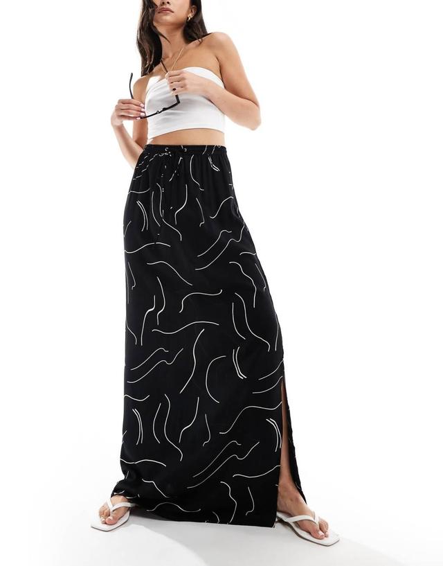 ASOS DESIGN tie waist maxi skirt in black and white linear print Product Image