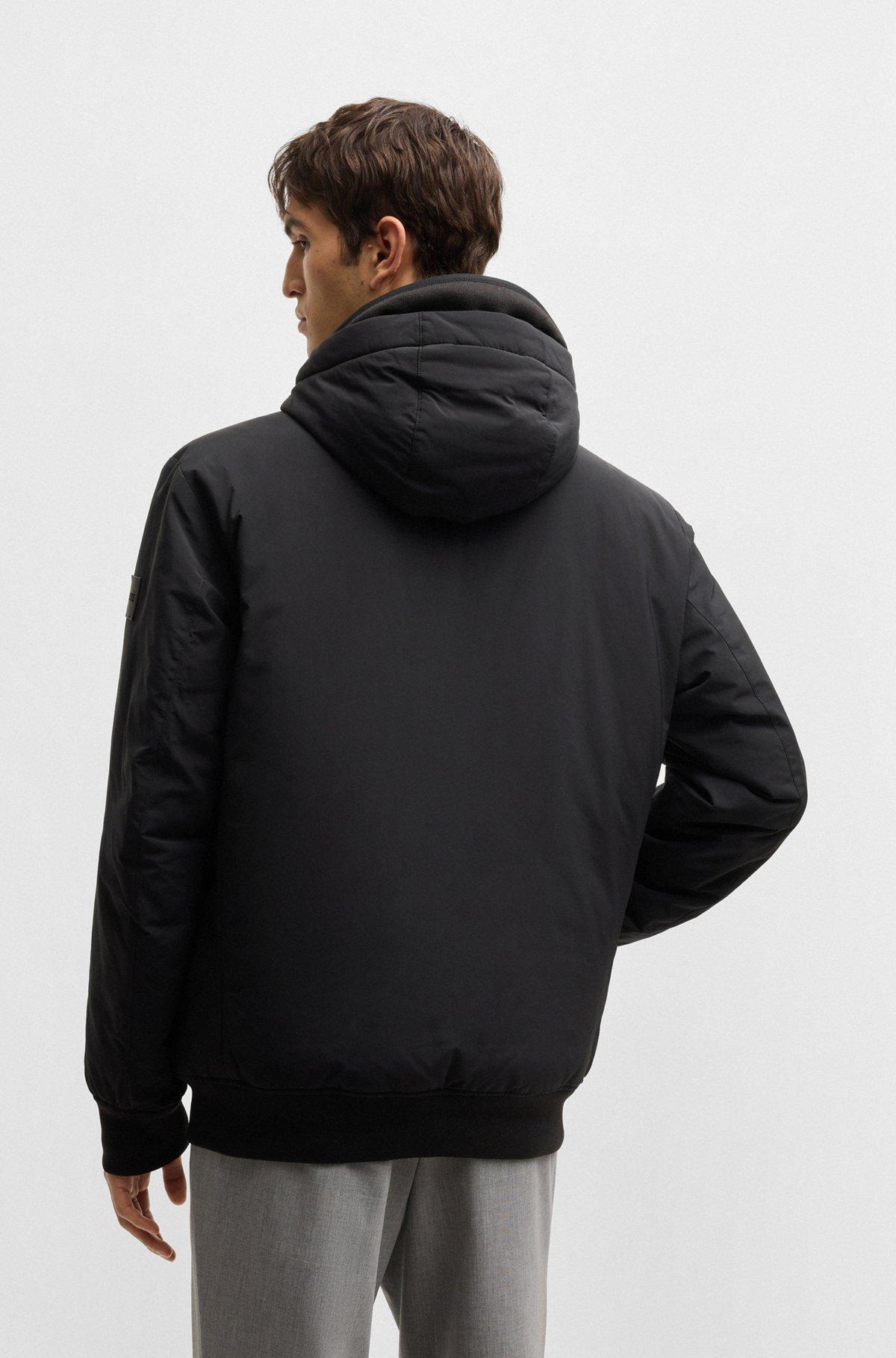 Water-repellent down jacket in a regular fit Product Image