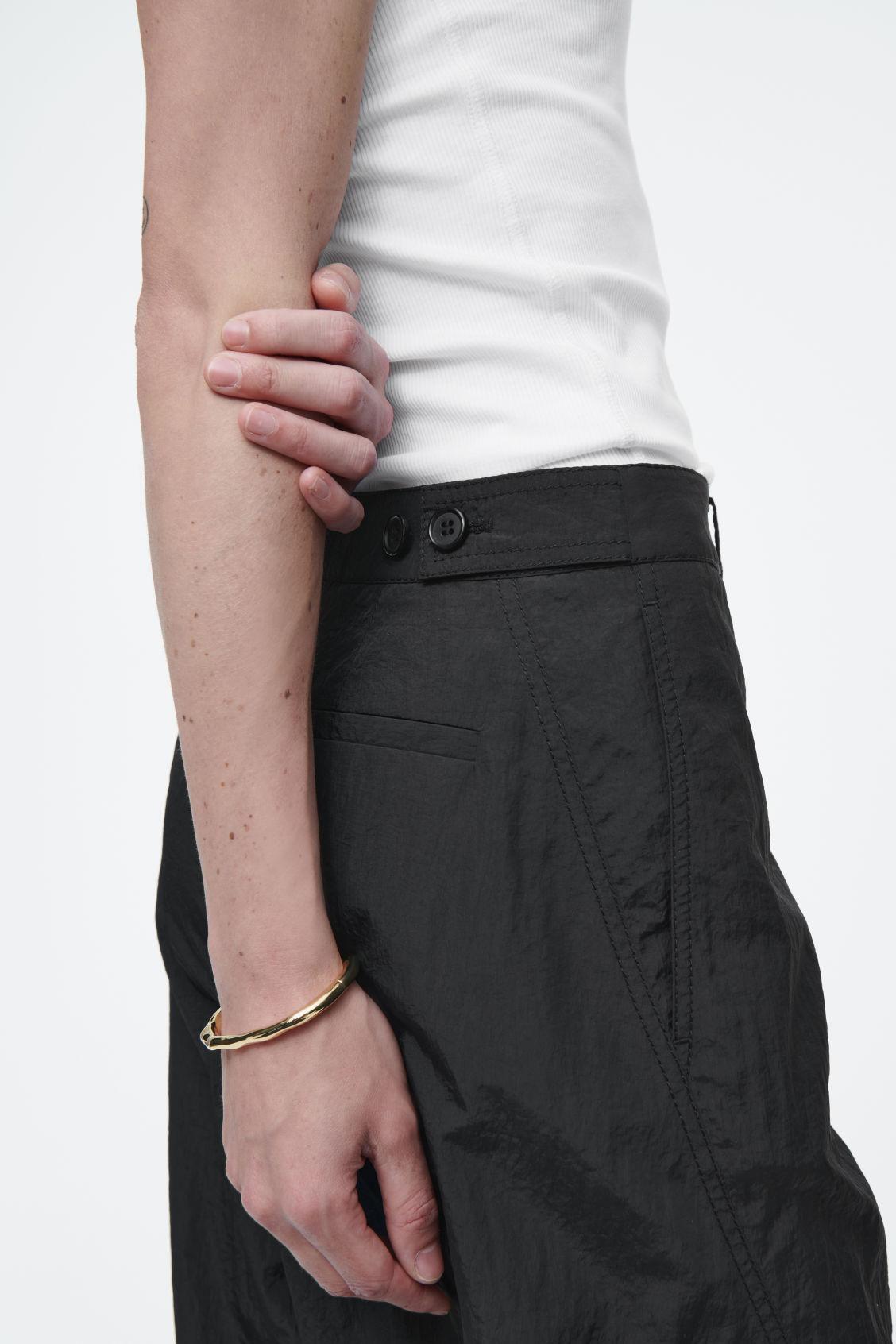 DECONSTRUCTED NYLON BARREL-LEG PANTS Product Image