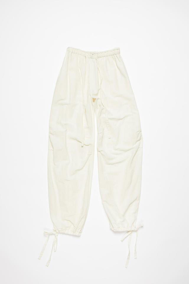 ACNE STUDIOS Relaxed Drawstring Trousers In Warm White Product Image