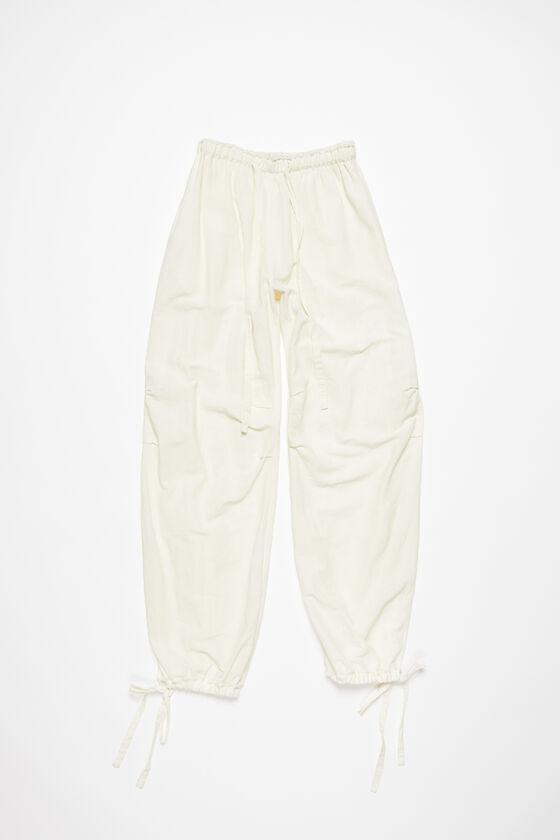 Relaxed drawstring trousers Product Image