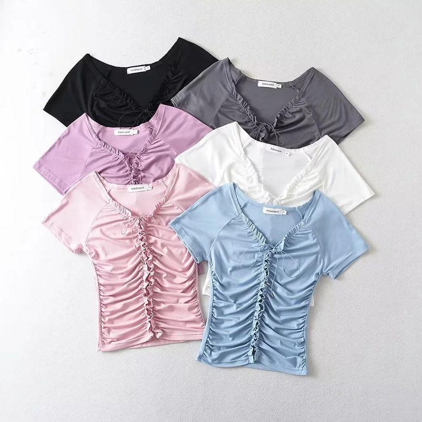 Short Sleeve V-Neck Plain Ruffled-Trim Lace Up Slim-Fit Crop Top Product Image