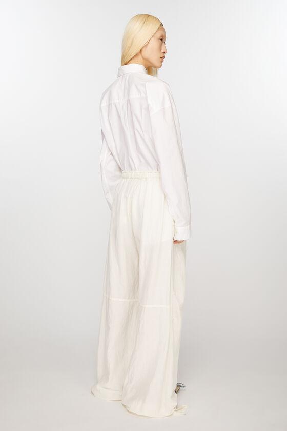 Relaxed drawstring trousers Product Image