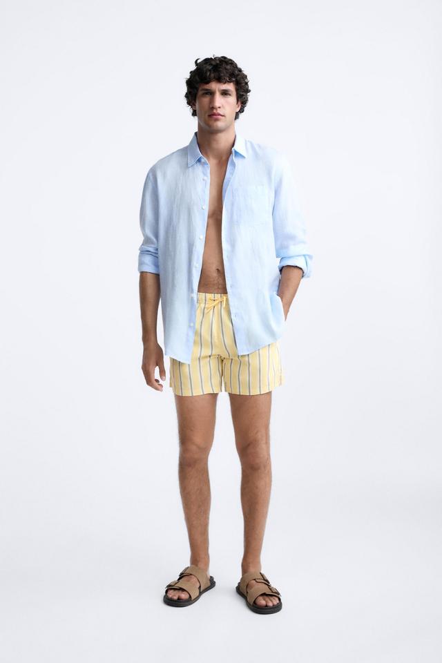 STRIPED REGULAR SWIMMING TRUNKS Product Image