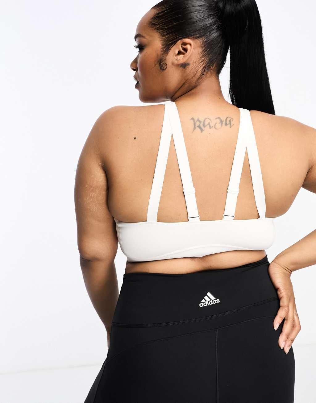 adidas Training Plus chest logo high-support sports bra in white Product Image