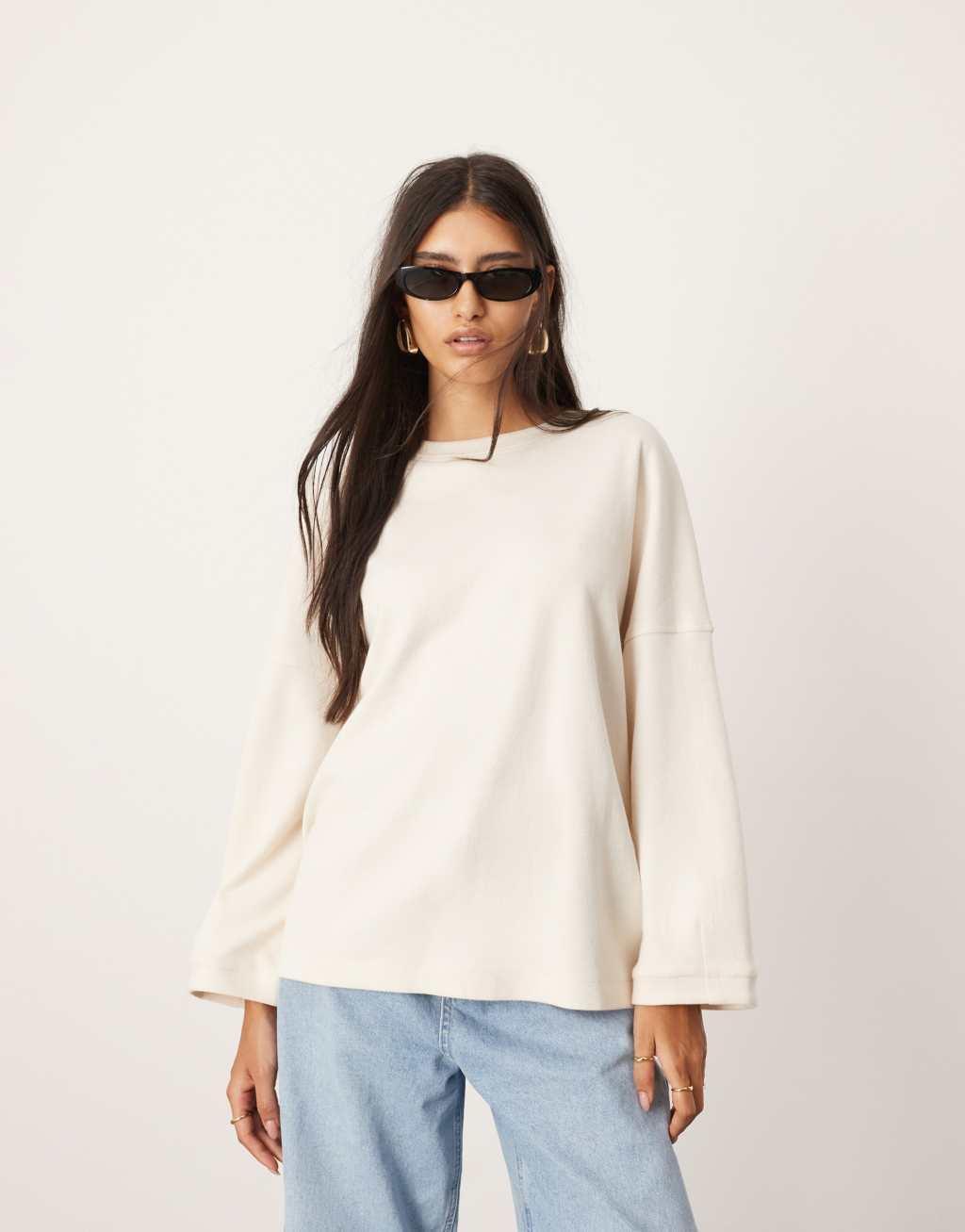 ASOS EDITION textured heavy weight jersey top with seam detail in ivory Product Image