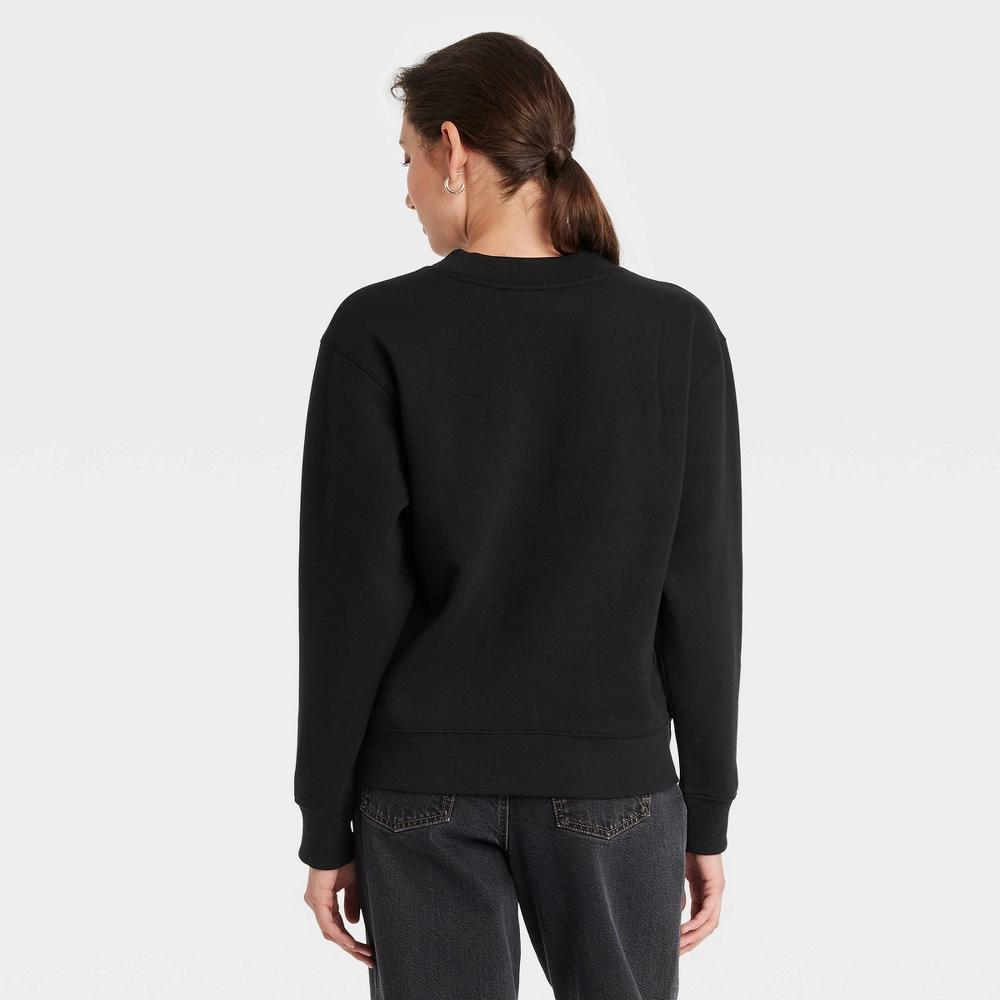 Women's Leisure Studio Graphic Sweatshirt - Universal Thread™ Black M Product Image