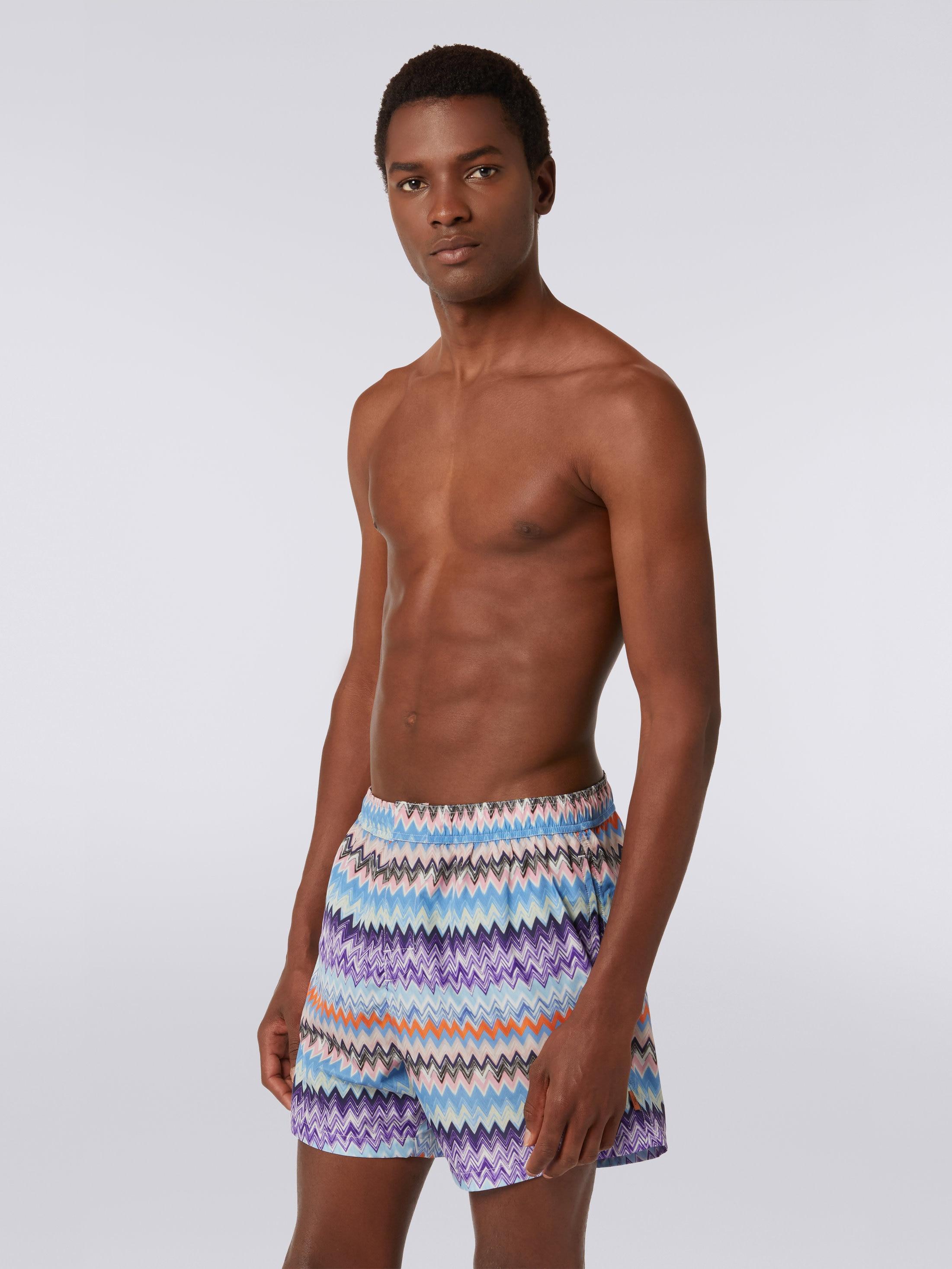 Technical fabric swimming trunks with chevron print Product Image