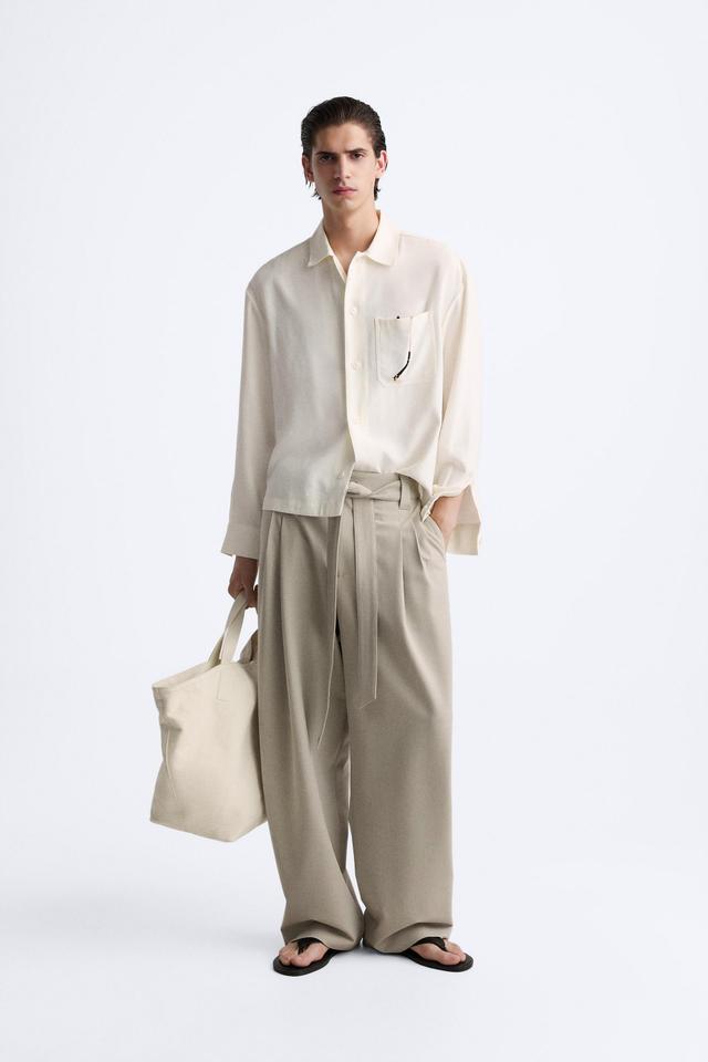 BELTED RELAXED PANTS Product Image