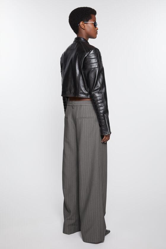 Deconstructed pinstripe trousers Product Image