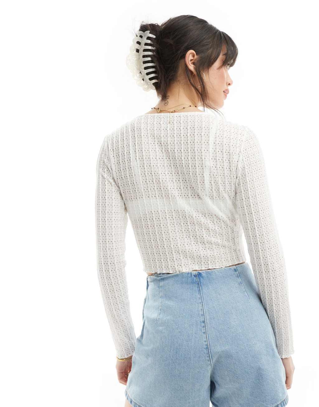 ONLY cropped long sleeve v-neck top in white pointelle   Product Image