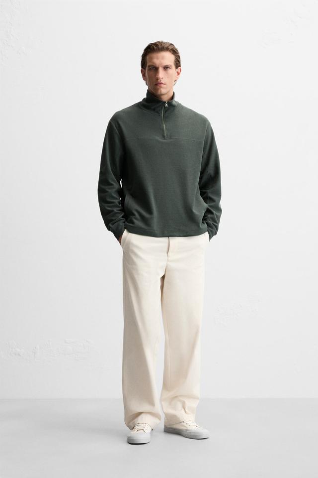 QUARTER ZIP SWEATSHIRT Product Image