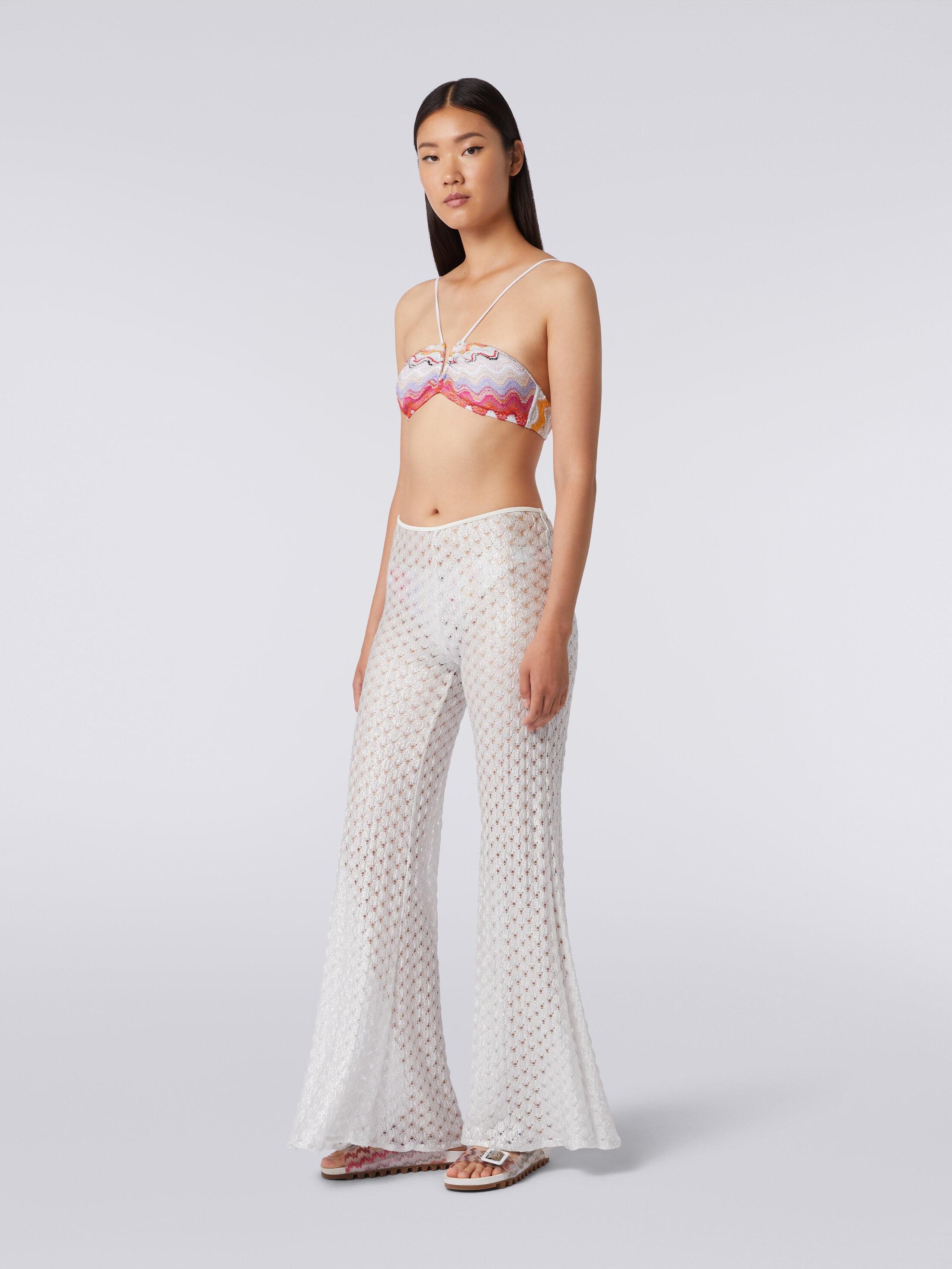 Lace-effect cover up trousers with flared hem Product Image