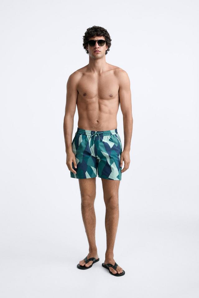 LONG ABSTRACT PRINTED SWIMMING TRUNKS Product Image