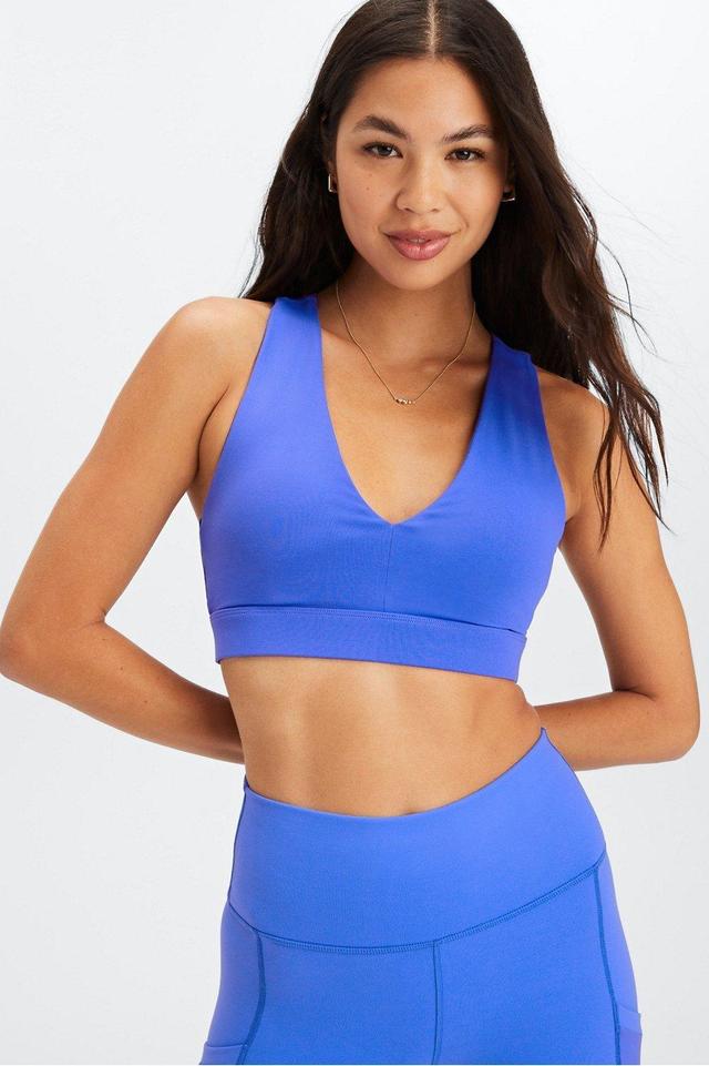 Fabletics On-The-Go Midi Medium Impact Sports Bra Womens blue plus Size 3X Product Image