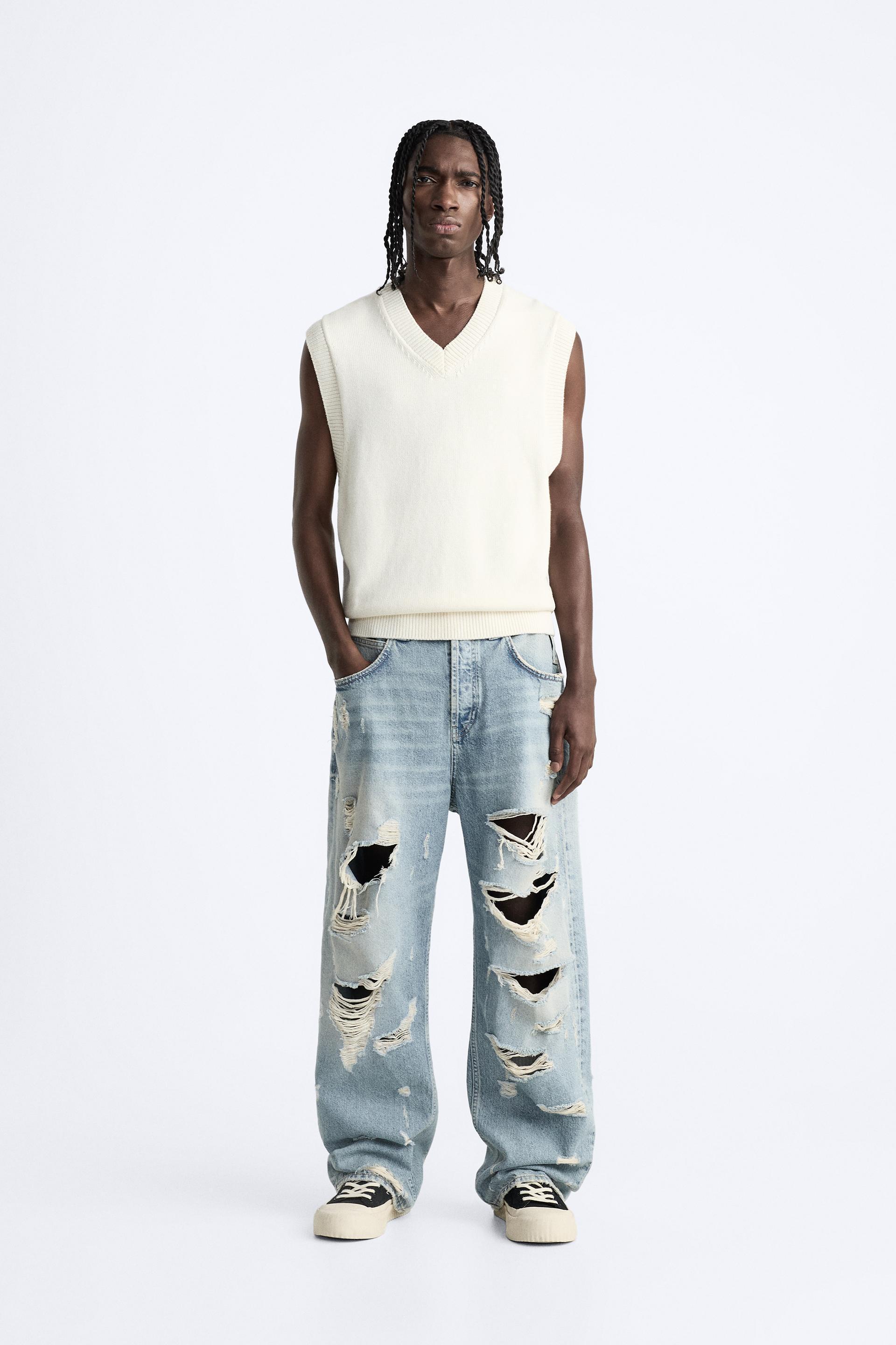 RIPPED EXTREME WASHED JEANS Product Image